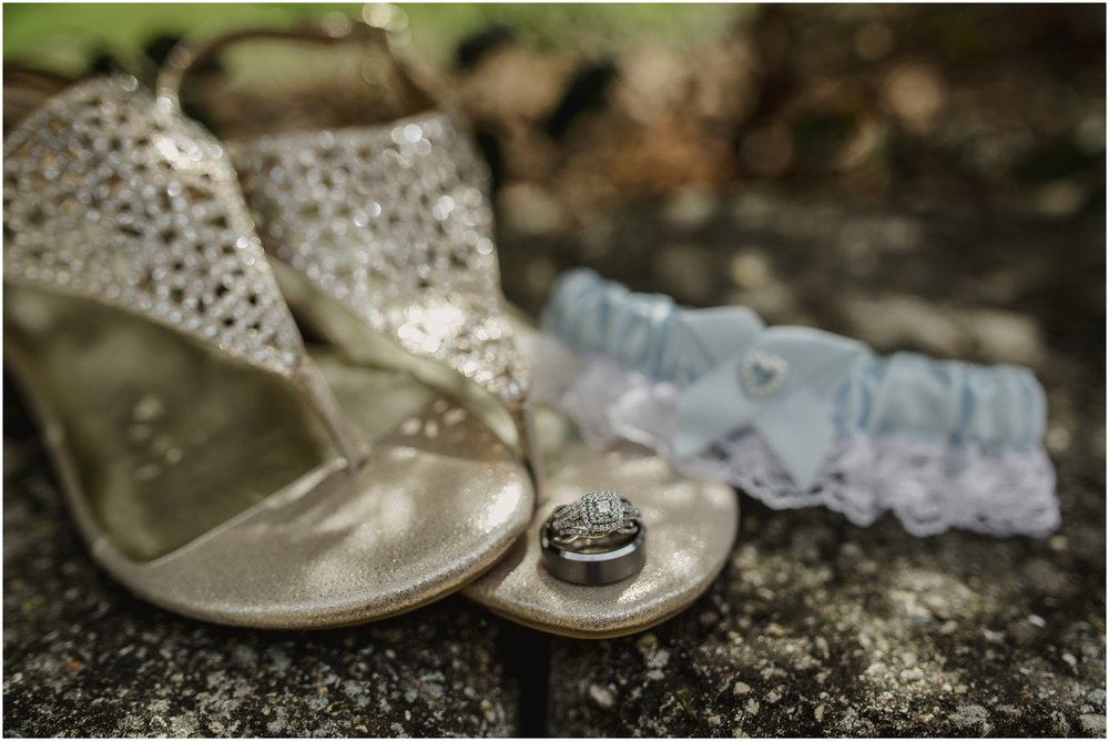 Wedding ring, shoes and garder at Evins Mill wedding venue
