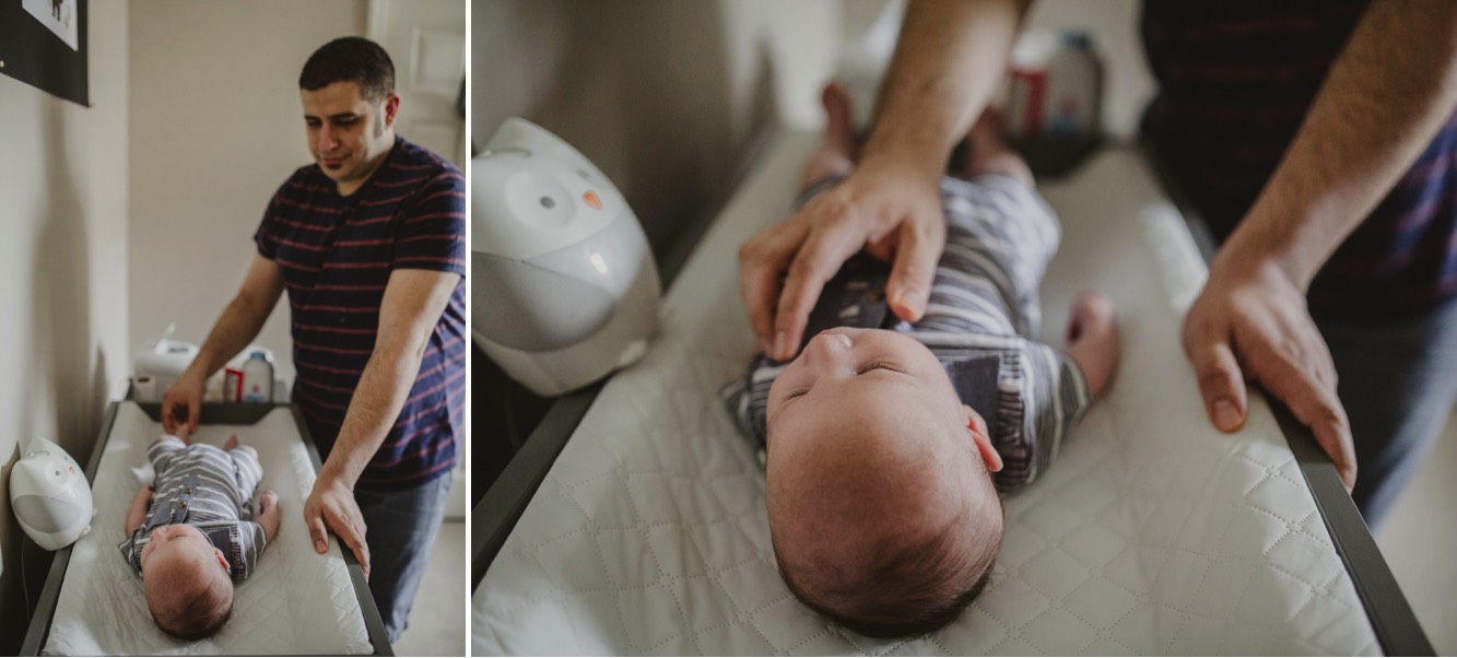 Dad looks at his baby boy during newborn session in spring hill, Tennessee.