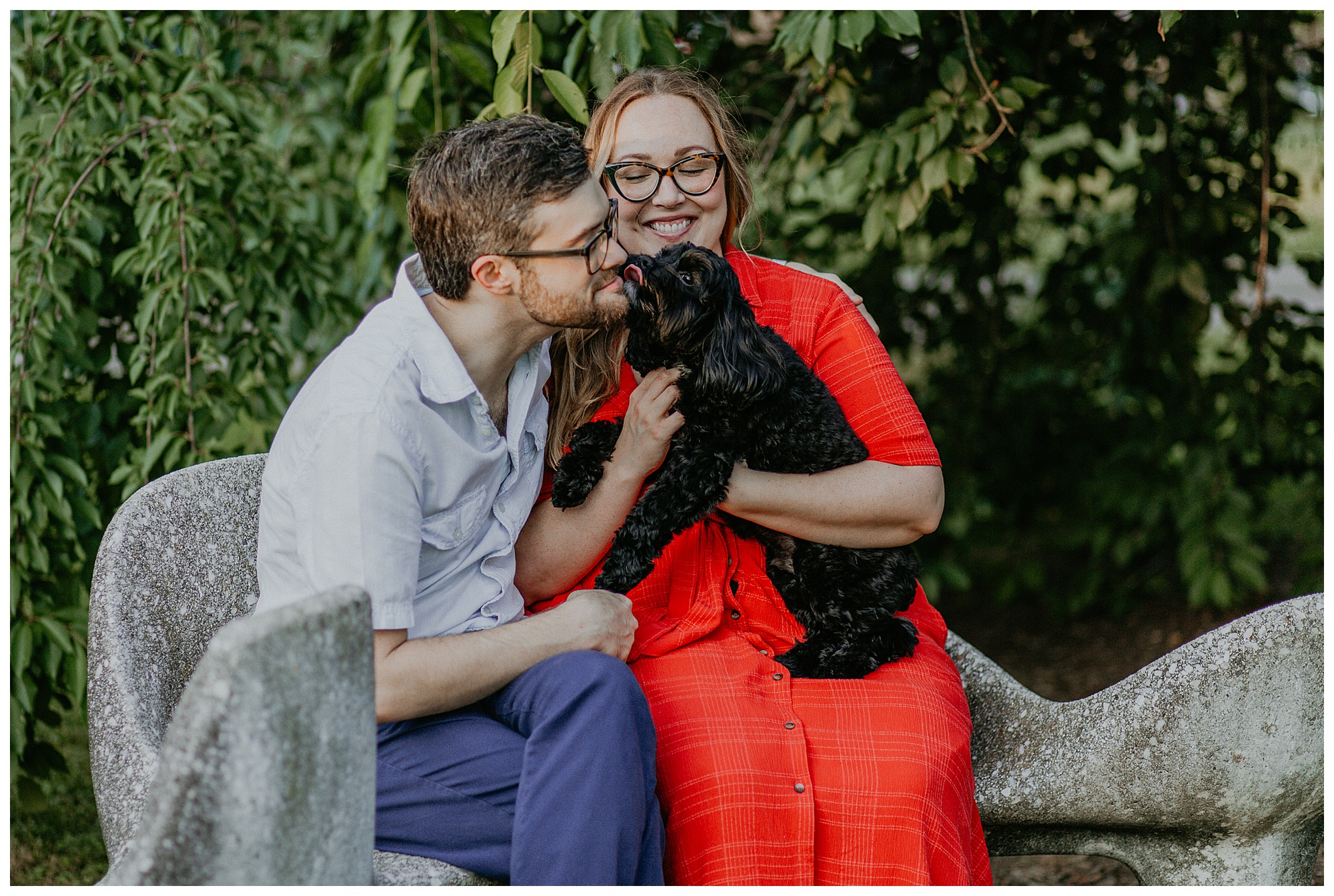 Engagement session at Centennial Park with black puppy.