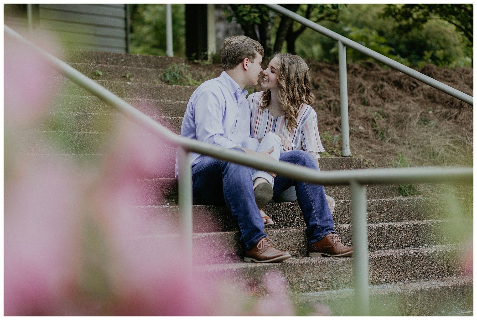Couple kisses during engagement at Radnor Lake