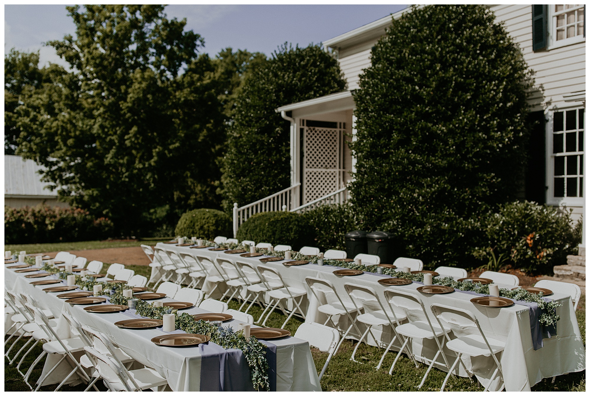 the outdoor reception space with tables set up at Cool Springs House.