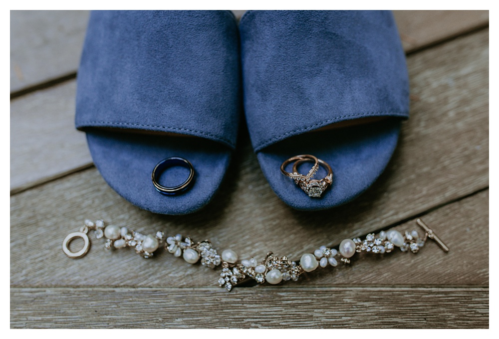 wedding jewelry and blue shoes