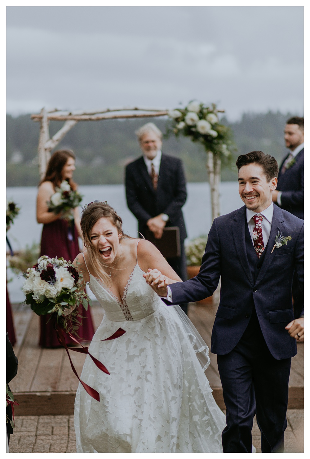 the excitement of being married as the bride laughs uncontrollably from marrying her groom at the Kiana Lodge in Washington State.