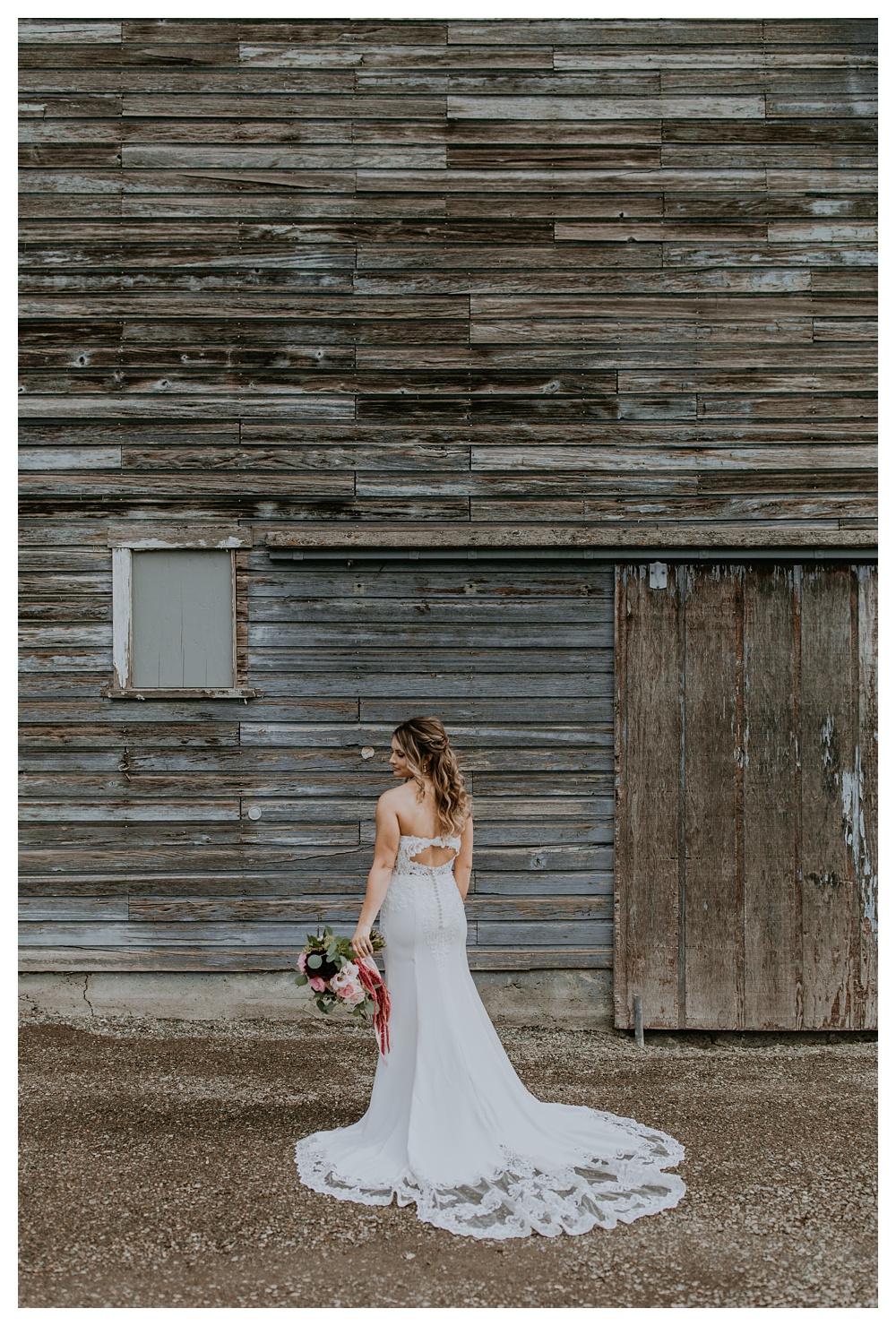 Bride's back side of dress detail while standing in front of the rustic barn at Mount Peak Farm in Washington State Washington State Wedding Photographer, Mount Peak Wedding Venue, PNW Wedding Photographer