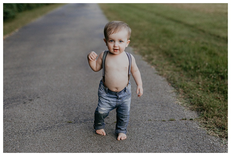 little boy in suspenders, Spring Hill family photographer, Spring Hill Tennessee, Spring Hill Photographer, Franklin Family photographer, Kedron Walking Trail, family photo clothing, family photo ideas, outdoor family photos, park family photos, 