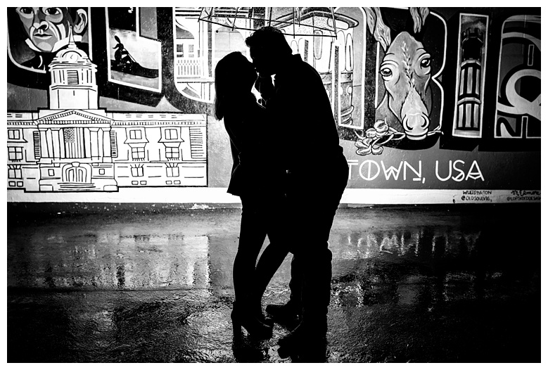 engaged couple in front of columbia TN mural, nashville engagement, nashville engagement photographer, Columbia Tennessee, outdoor engagement photos, Spring Hill engagement photographer, summer engagement photos, mule town Tennessee, columbia tn mural
