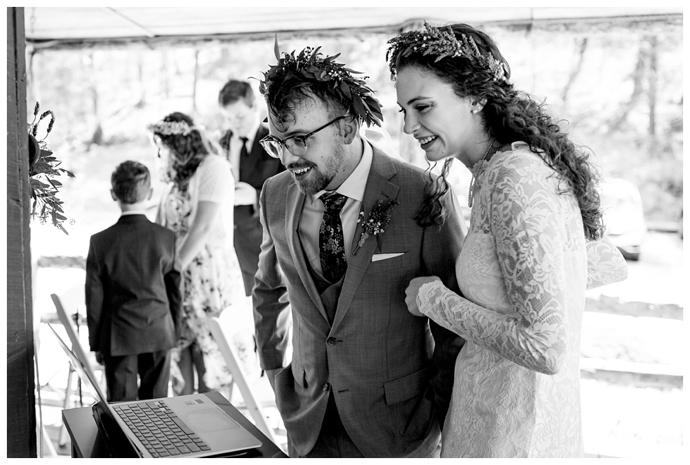 the bride and groom talk to their guests via internet, nashville wedding photographer, nashville wedding, nashville Tennessee wedding, intimate wedding, bohemian wedding, intimate bohemian wedding, intimate nashville wedding, intimate mountain wedding, intimate backyard wedding, intimate elopement, Tennessee elopement