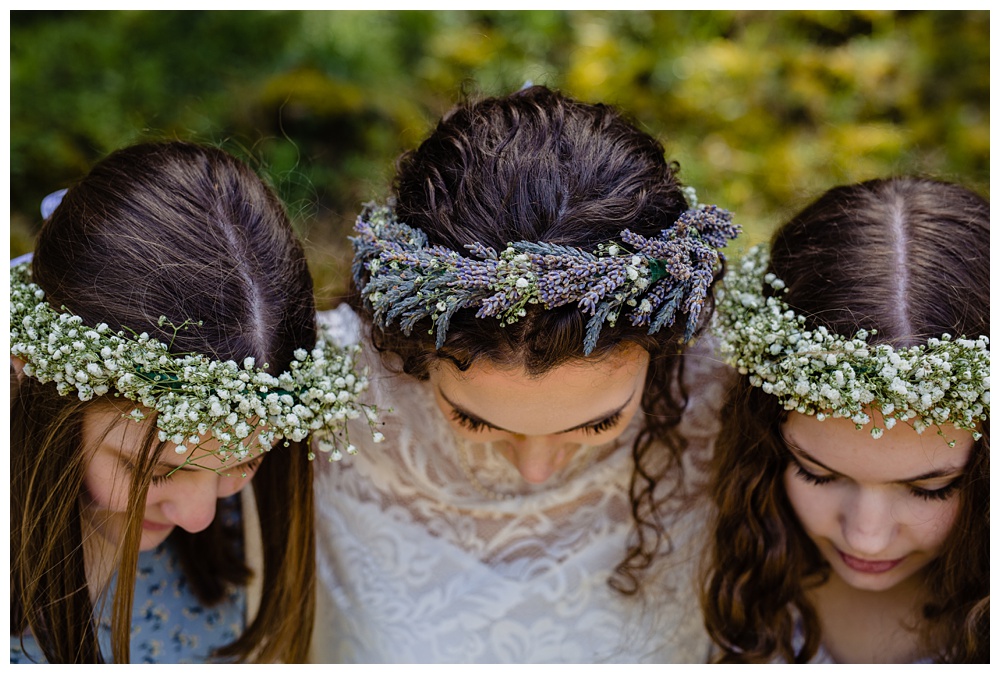 the bride and her sisters showing off their flower crowns, nashville wedding photographer, nashville wedding, nashville Tennessee wedding, intimate wedding, bohemian wedding, intimate bohemian wedding, intimate nashville wedding, intimate mountain wedding, intimate backyard wedding, intimate elopement, Tennessee elopement