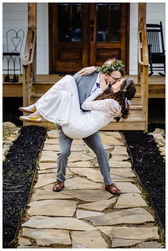 the groom picks up and dips his bride during portraits, nashville wedding photographer, nashville wedding, nashville Tennessee wedding, intimate wedding, bohemian wedding, intimate bohemian wedding, intimate nashville wedding, intimate mountain wedding, intimate backyard wedding, intimate elopement, Tennessee elopement
