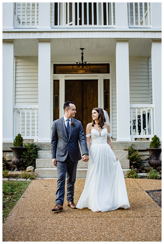 the bride and groom walk towards the camera in front of Drakewood Mansion, nashville wedding photographer, nashville wedding, nashville Tennessee wedding, intimate wedding, Drakewood Farm, intimate nashville wedding, intimate outdoor wedding, intimate backyard wedding, intimate elopement, Tennessee elopement