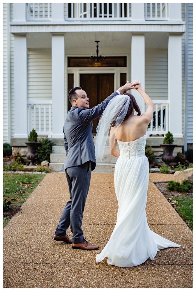 the groom spins his bride in front of Drakewood Mansion, nashville wedding photographer, nashville wedding, nashville Tennessee wedding, intimate wedding, Drakewood Farm, intimate nashville wedding, intimate outdoor wedding, intimate backyard wedding, intimate elopement, Tennessee elopement