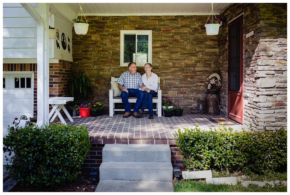 a married couple sit on their front porch, nashville family photographer, family pose ideas, photo clothing ideas, what to wear for photos, best Nashville family photographer, best Nashville Photographer, Nashville's best portrait photographer, experienced nashville family photographer