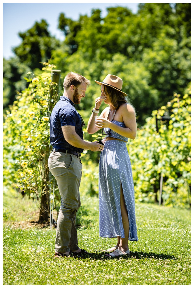 nashville proposal photographer, surprise proposal, arrington vineyards, Tennessee winery, best surprise proposal photographer, best Nashville Photographer, best Nashville proposal photographer, Tennessee photographer, couples photographer, Woman wipes tears off her face after her boyfriend proposes to her